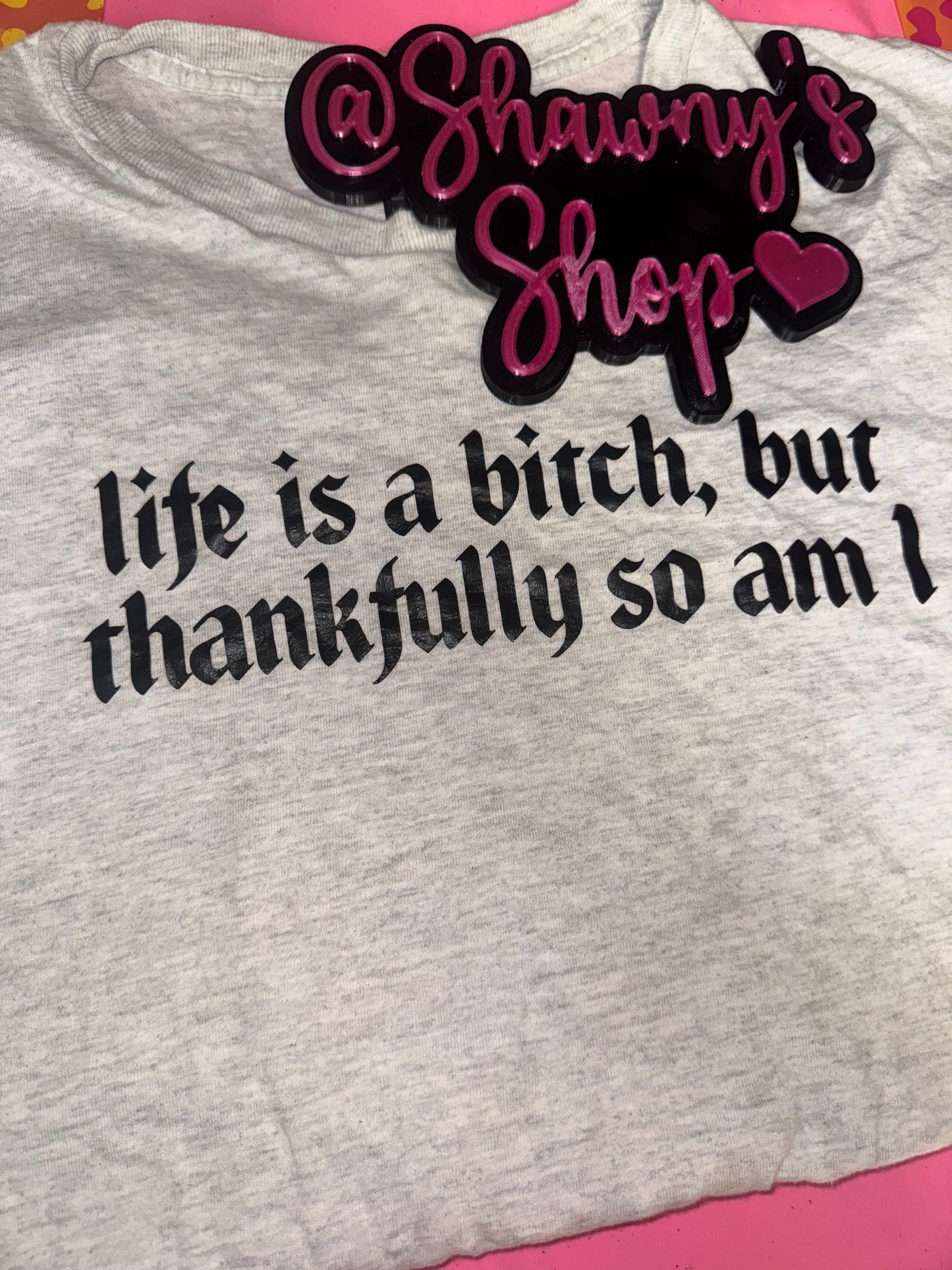 Life is a b top