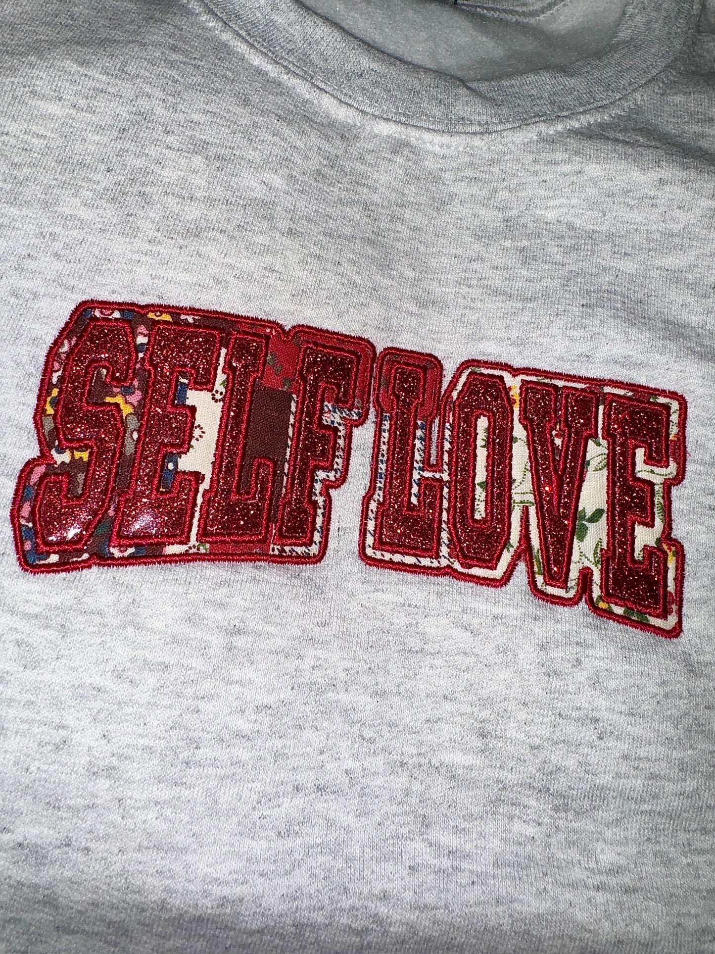 SELF LOVE glitter/fabric embroidered sweater