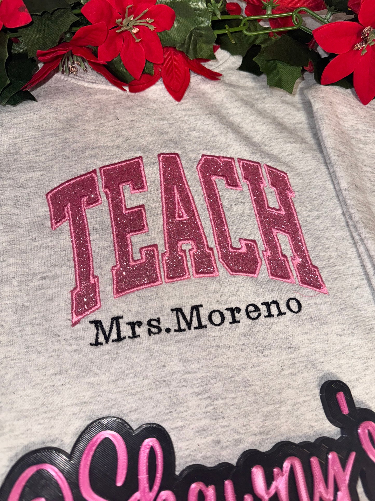 Embroidered teach side pencil sweater top