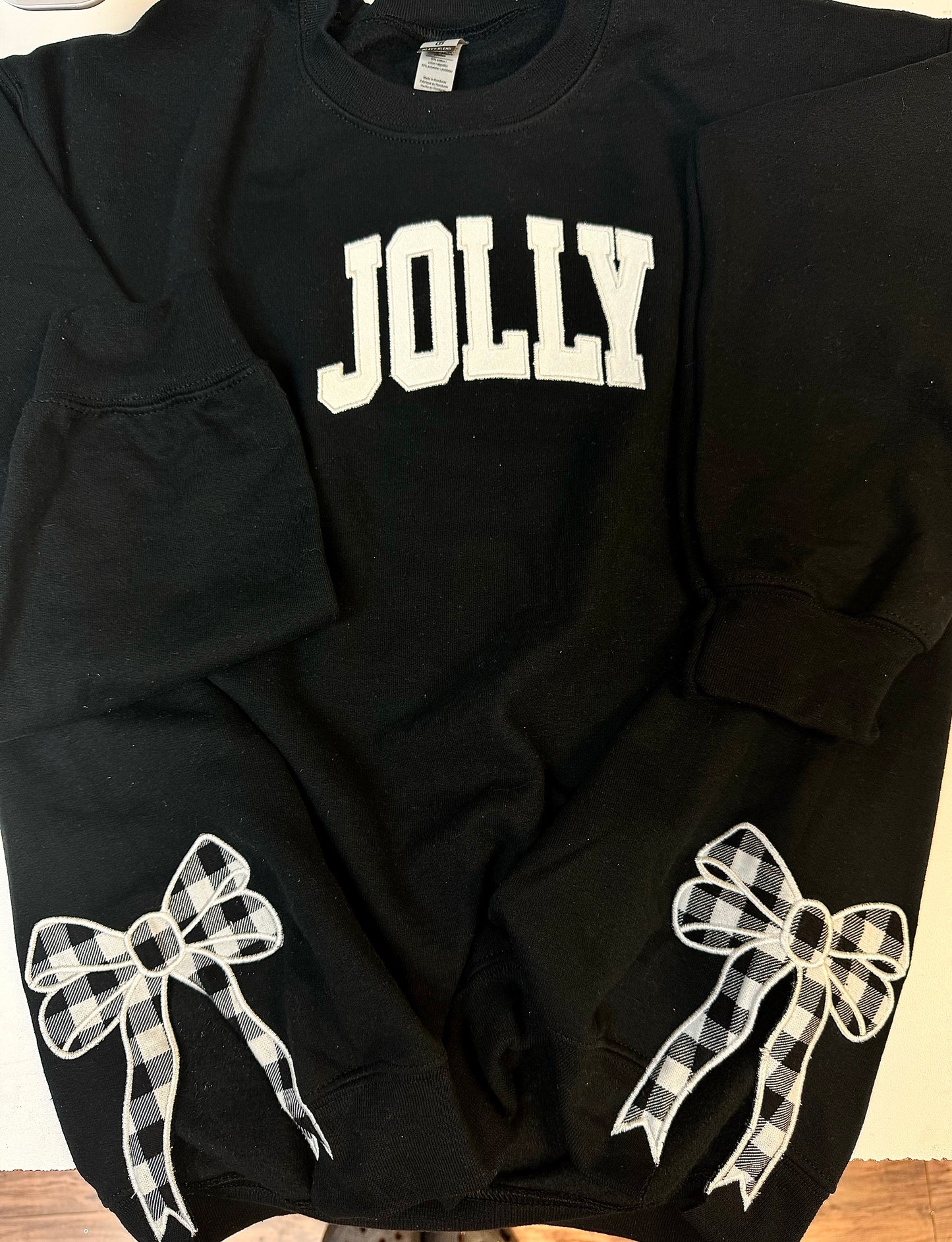 Embroidered glitter JOLLY w/ plaid side bows sweater top