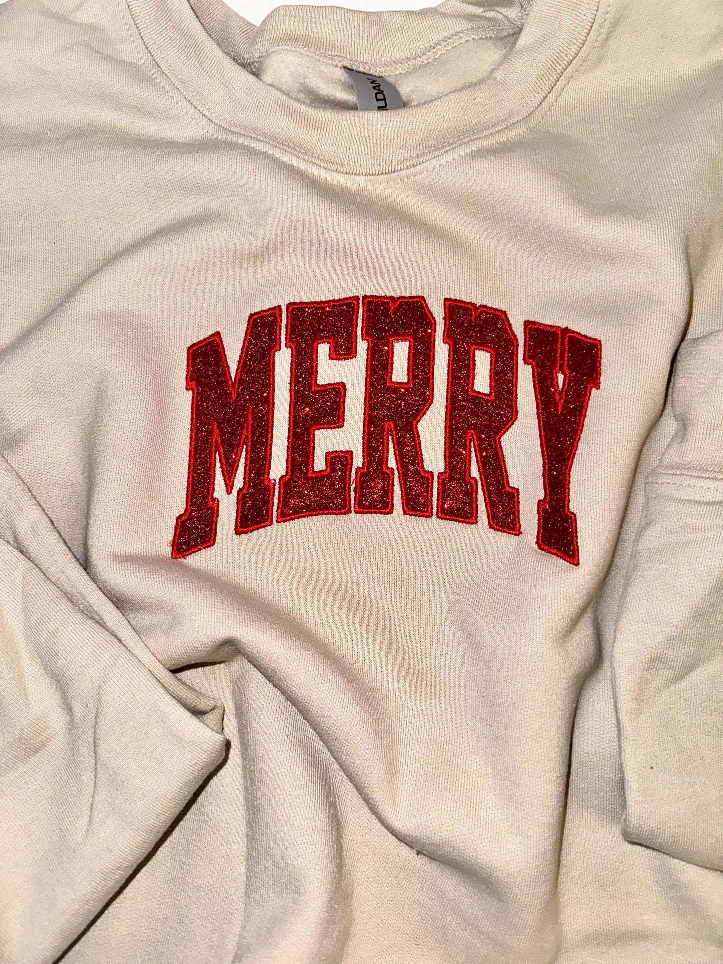 Embroidered glitter MERRY w/ added glitter side bows sweater top