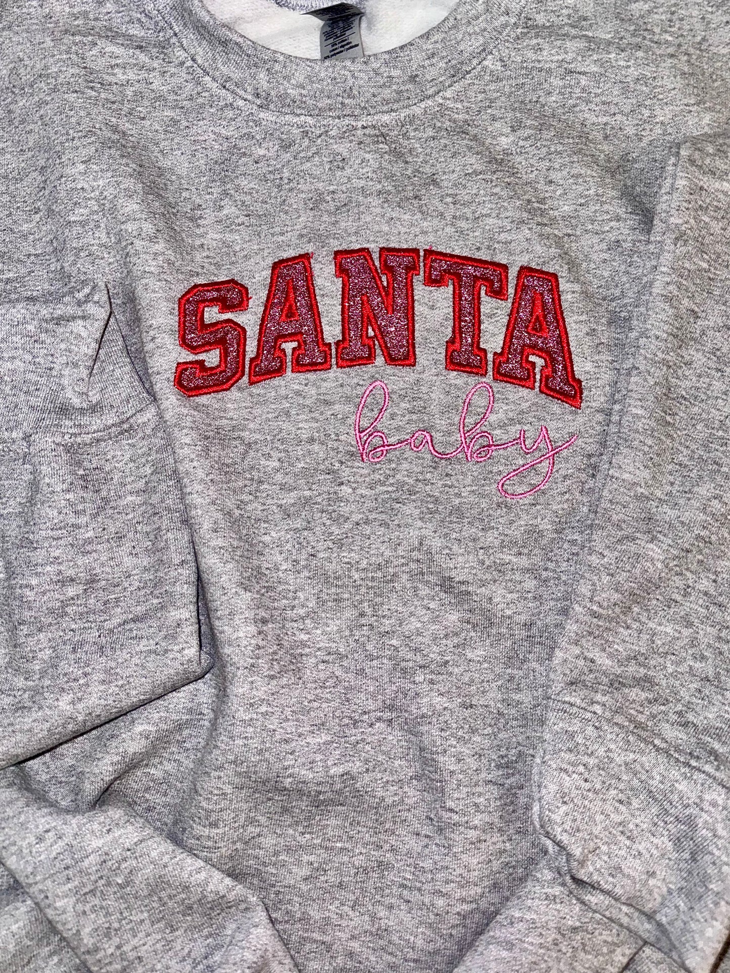 Embroidered glitter Santa Baby w/ added glitter side bows sweater top
