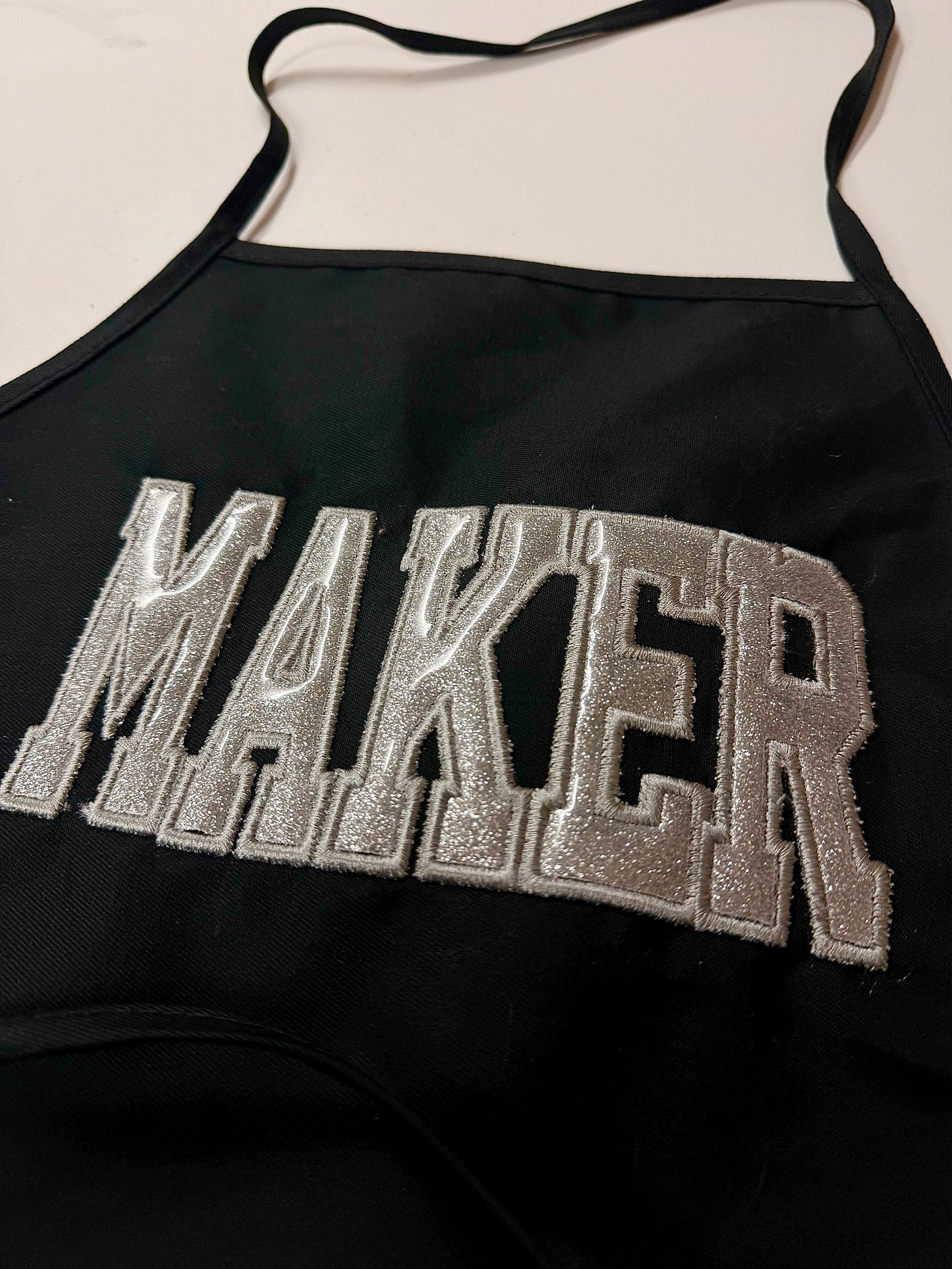 Glitter embroidered MAKER apron top