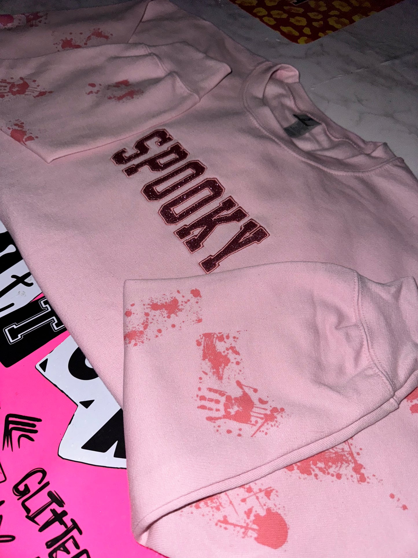 Embroidered pink on pink SPOOKY sweater
