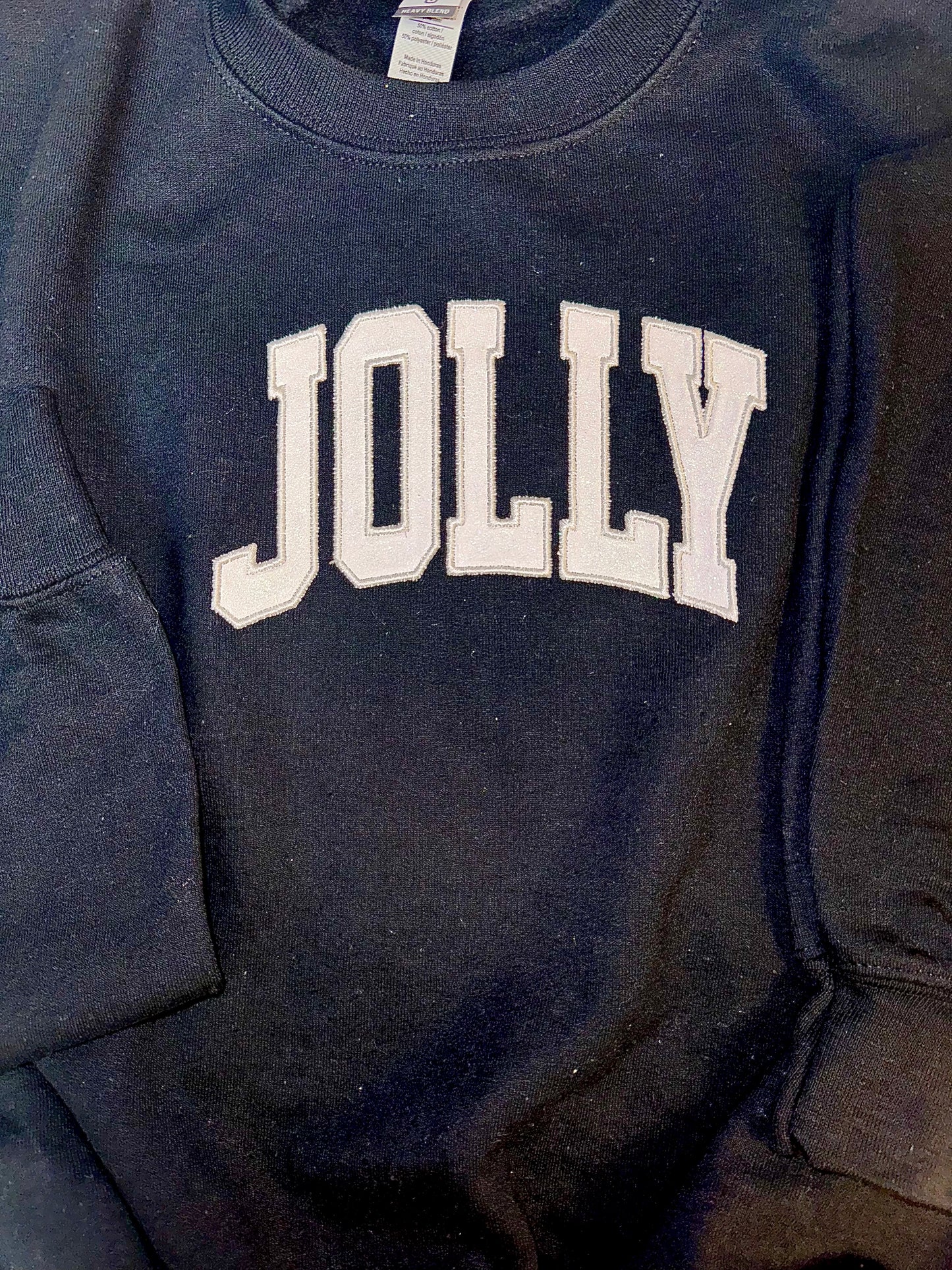 Embroidered glitter JOLLY w/ plaid side bows sweater top