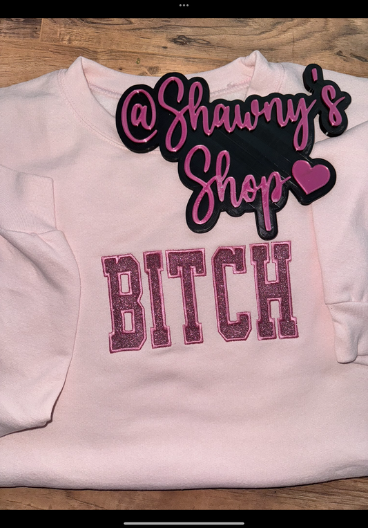 B embroidered sweater top